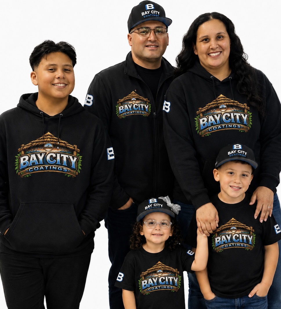 The Cruz family, founders of Bay City Coatings, wearing matching branded apparel